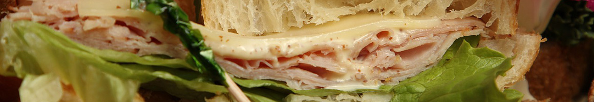 Eating Sandwich Cafe at Antigua Coffee Shop restaurant in South San Francisco, CA.